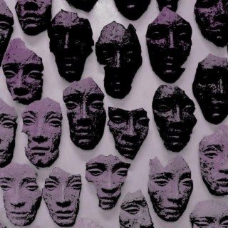 Pattern of dark, fragmented stone faces arranged in rows against a pale lavender background, each face showing varying expressions and degrees of erosion